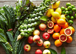 a group of fruits and vegetables on a wood surface Healthy Weight Loss Diets Harrow